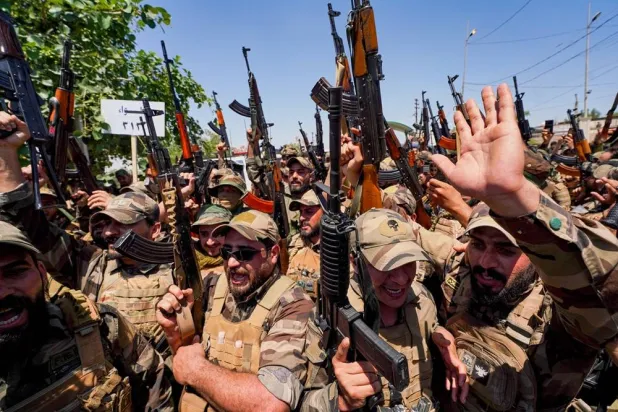Sadr Hands over Saraya al-Salam to Iraqi Govt as PMF to Be ‘Restructured’