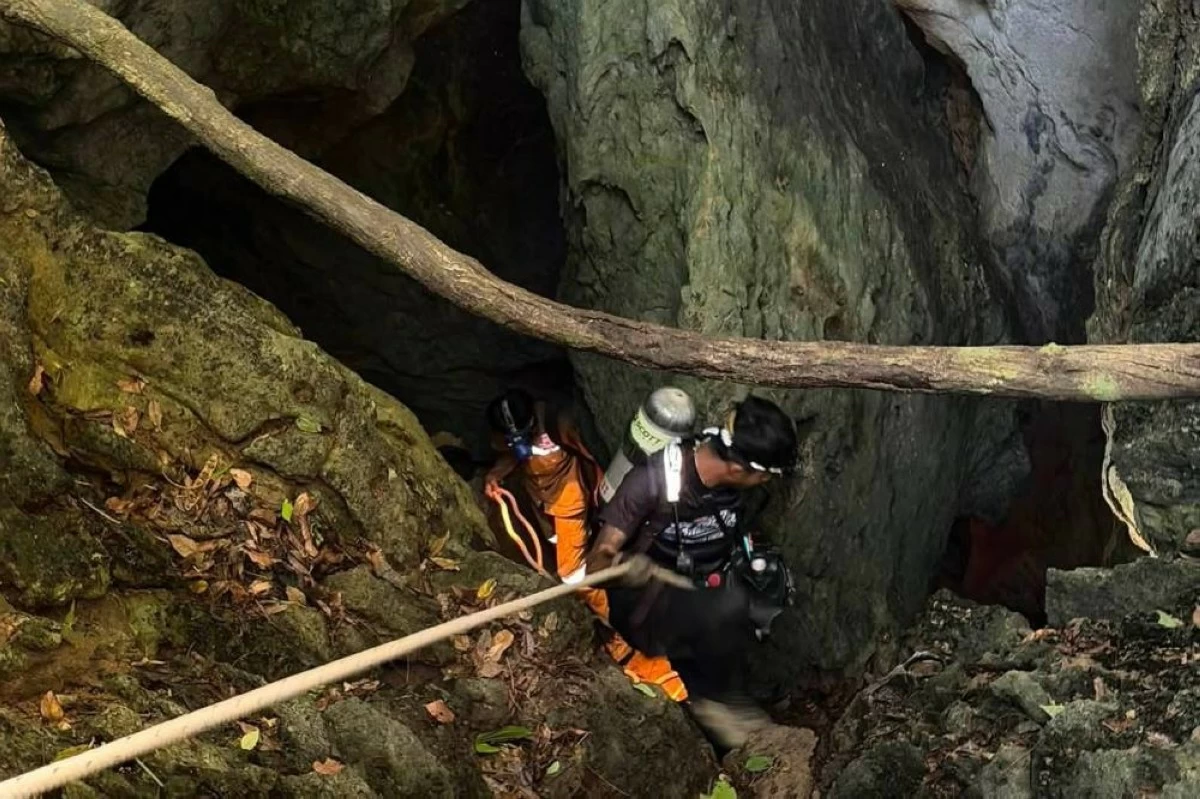 Laos halts search for missing men in flooded cave after two weeks