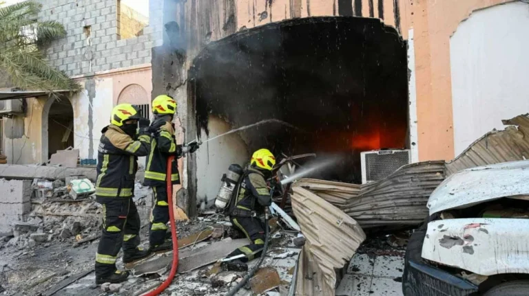 Bahrain says debris from intercepted Iranian drones injures child, damages homes