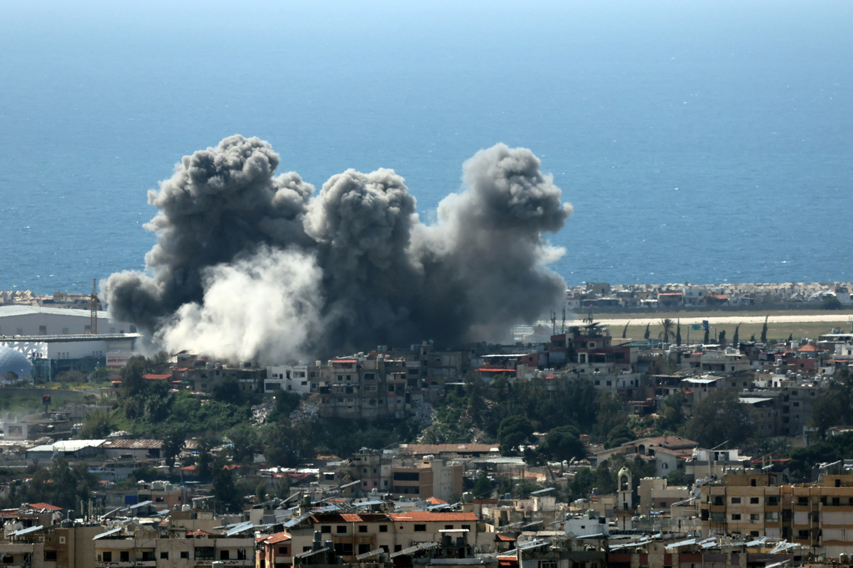 Iran warns of ‘decisive’ response to Israeli strike on southern Beirut