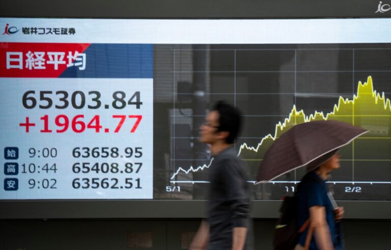 Stock market hits record high in Japan as AI industry booms
